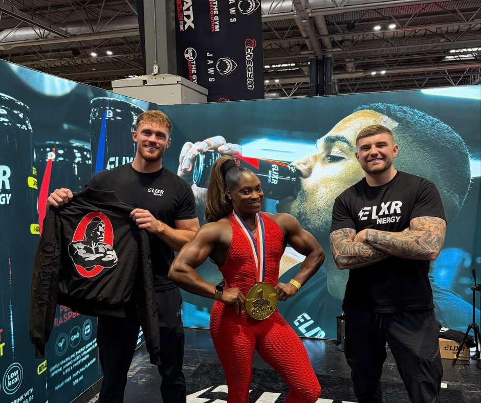 Elixr team at event with Mrs Olympia