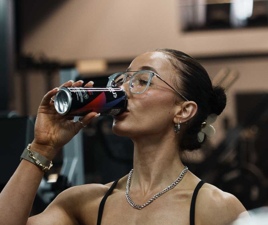 Woman trying a sample of Elixr energy